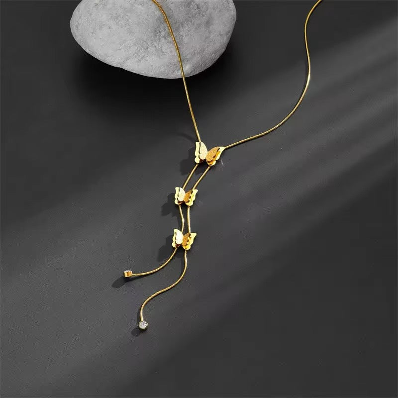 Golden Cascading Butterfly Pendant Necklace