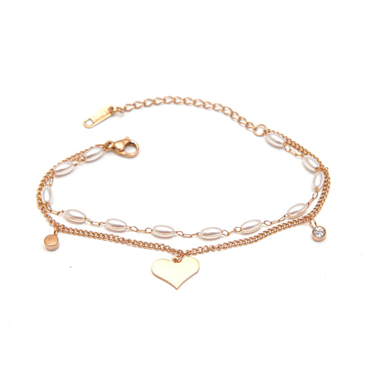 Elegant Pearl and Heart Charm Bracelet